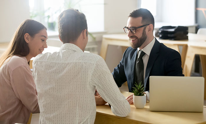 Couple meeting a tax accountant.